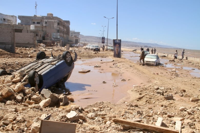 Grieving Libyans in desperate search for missing relatives after storm’s wrath-صحيفة الصوت